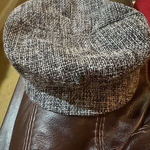 Stylish Black and White Tweed Cap
Never worn